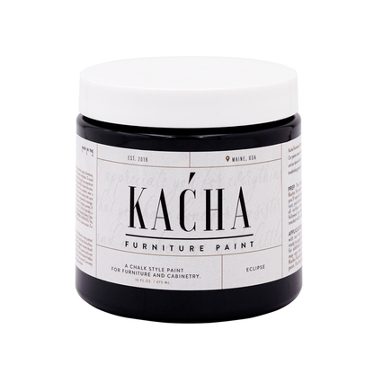 Jar of Kacha furniture paint on a white background